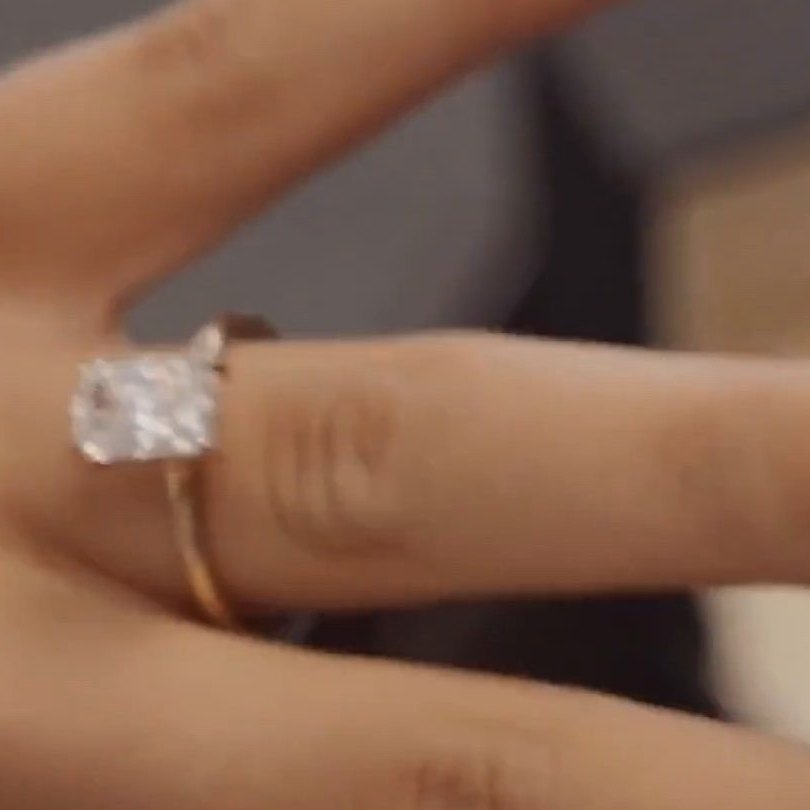 Diamond engagement ring worn on the hand, on Instagram
